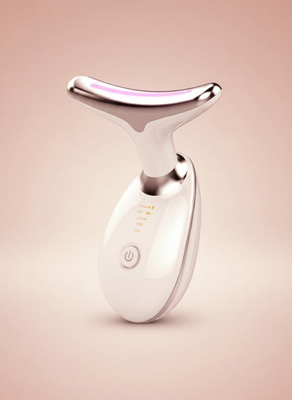 The Glow Lab anti-wrinkle facial toning device in white and rose gold with a curved head and LED indicator lights.