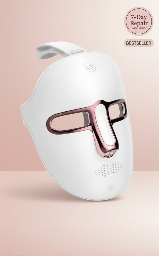 The Glow Lab 7-color LED light therapy facial mask in white with rose gold accents for home skin rejuvenation.